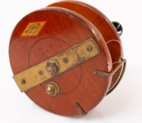 Fishing: a mid century mahogany and brass trolling reel, 15.5cm diameter, by Peetz Tackle Ltd, 574 J