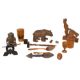 Treen: an articulated Black Forest desktop toy carved as a man having his coat pulled by a dog, tail - Image 1 of 3