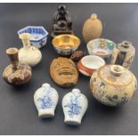 Oriental: a Chinese wicker covered snuff bottle, 6.7cm, a pair of blue and white bottles, 5.0cm, a m