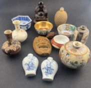 Oriental: a Chinese wicker covered snuff bottle, 6.7cm, a pair of blue and white bottles, 5.0cm, a m