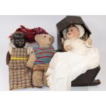 Toys: an early 20th century dolls crib, probably home made, together with a German bisque headed dol