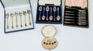 Silver: a boxed set of coffee spoons, Sheffield 1924, 39g; a boxed set of Silea silver plated coffee