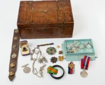 Costume Jewellery: an Israeli silver brooch set with green stones; a white metal ring in box; a WW2 