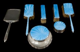 The Denis Lacy Hulbert Collection: Silver; a seven piece pale blue guilloche enamelled dressing tabl