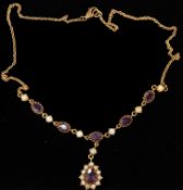 Jewellery: a 9ct yellow gold Lavalier necklace set with alternate pearls and amethysts, the drop an 