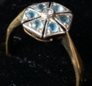 Jewellery: an 18ct yellow gold Art Deco ring modelled as a flower head, each of the six petals claw 