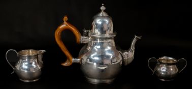 The Denis Lacy Hulbert Collection: Silver; an early 18th century style three piece tea set by Denis 