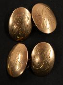 Jewellery: a pair of 15ct gold cufflinks, with oval ends, each engraved with initials. Combined weig