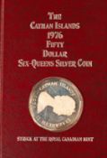 Coins: a Cayman Islands 1976 fifty dollar 'Six Queens' silver coin, boxed. Believed to weigh 64.94g,