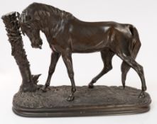 Metalware: an Animalier bronzed group depicting a horse by a tree stump, the base bearing the signat