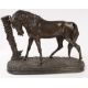 Metalware: an Animalier bronzed group depicting a horse by a tree stump, the base bearing the signat - Image 1 of 5