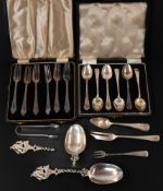 Silver: a set of six pastry forks, together with a set of six teaspoons, both boxed; a set of Victor