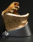 Jewellery: Ole Lynggaard- a yellow and white metal clasp, marked Ole L 585 and testing as 14ct gold,