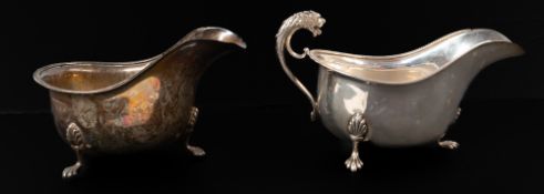 Silver: a sauceboat, Birmingham 1932, with bifurcated handle terminated by a roaring leopard mask, t