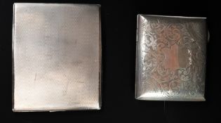 Two silver cigarette and card cases, Birmingham 1899 and Sheffield 1933, the first with engraved fol