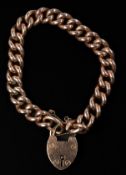 Jewellery: a 9ct rose gold curb link bracelet, with engraved heart clasp. overall length c.19cm, 19.
