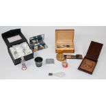 Decorative Arts: a 19th century teardrop scent bottle, a boxed Oleg Cassini bottle, two further glas