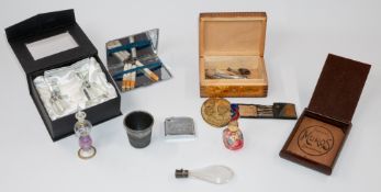 Decorative Arts: a 19th century teardrop scent bottle, a boxed Oleg Cassini bottle, two further glas