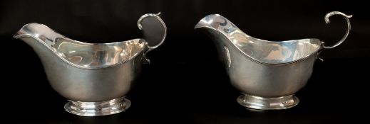 The Denis Lacy Hulbert Collection: Silver; a pair of sauceboats by Adie Brothers, Birmingham 1935, w
