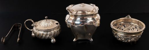 Silver: a bombe shaped silver tea caddy by Roberts & Belk, Sheffield 1924, finial lacking; a Vic