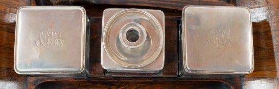Decorative Arts: a Victorian coromandel veneered standish of rectangular form with curved ends, thre