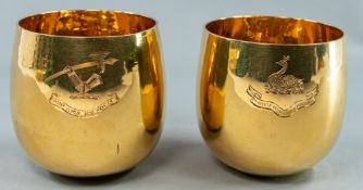 The Denis Lacy Hulbert Collection: Objects Of Vertu; a near pair of 22ct gold tumbler cups, the
