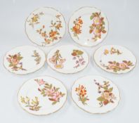 Ceramics: Seven Royal Worcester dessert plates, date codes for 1884 to 1895, decorated with sprays o