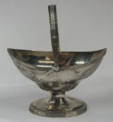Silver: a Georgian silver sugar basket, Peter and Ann Bateman, London 1794, of navette shape with a 