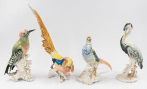 Ceramics: a pair of Karl Ens porcelain figures of fancy pheasants, 20th century, with long tails and