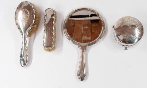 Silver: a ladies silver dressing table set, Birmingham 1918-21, each pieces engraved with the letter