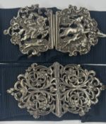 Silver: a nurses buckle, London 1898, cast with a huntsman on horseback blowing his horn to one side