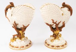 Ceramics: A pair of Royal Worcester 'Nautilus' vases, c.1891, each formed with a crisply moulded nau