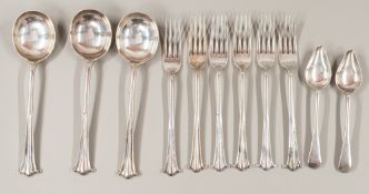 Silver: a set of six Onslow pattern forks, Birmingham 1939, three similar spoons, and two plated egg