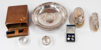 Silver: A silver-mounted cased brush and comb set, Chester 1912, contained within a faux crocodile s