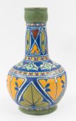 Ceramics: A James Plant pottery vase, c.1910, of Islamic bottle form, brightly decorated with geomet