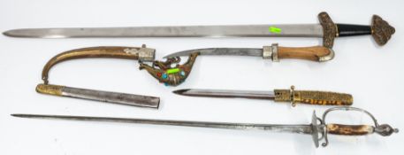 Militaria: a white metal mounted jambiya with treen handle; a Japanese tanto, with steel sheath and 