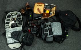 Photography: a Zenza Bronica camera, lenses, flashes, etc in carry case; a Ricoh DIA camera in case;