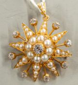 Jewellery: a yellow metal metamorphic star brooch, unmarked but testing as 14/15ct gold, set a centr