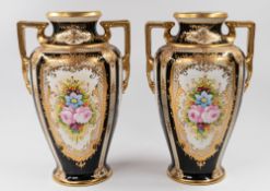Ceramics: A pair of large Noritake two-handled vases, modern, decorated with panels of flowers reser