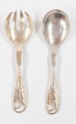 Silver: a pair of small salad servers by Georg Jensen, in the Ornamental pattern number 42, import m