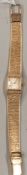 Watches: a ladies 9ct gold Rotary wristwatch, with integral mesh strap. 1.6cm across including crown