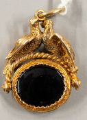 Jewellery: a 9ct gold swivel fob seal, the framework modelled as a pair of doves on a perch, the swi