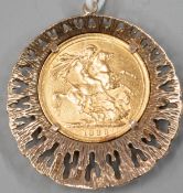 Coins: an 1888 Queen Victoria full gold sovereign in large ornate 9ct gold pendant mount, gross weig