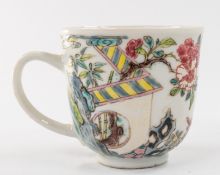Ceramics: a Worcester coffee cup, c.1760, painted in famille rose enamels with two quail beside bamb