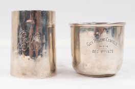 Silver: a tapering christening mug, London 1907, 8.7cm, together with a second of cylindrical form, 