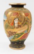 Asian Art: A Japanese Satsuma pottery vase, 20th century, decorated with figures amidst tube-lined d