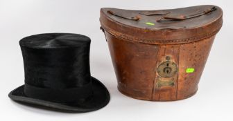Fashion: an early 20th century top hat by Christy's of London, in leather box, size very approximate