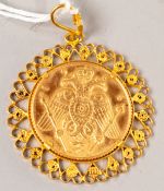 Coins: a 1966 Cypriot 22ct gold sovereign bearing the image of Makarios III, the reverse with a doub