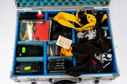 Photography: a Canon AE-1 camera, a Canon AV-1, a Nikon EM, together with associated lenses, filters