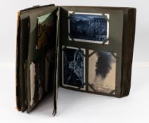 Postcards: an early 20th century postcard album, c.1922, around 100 postcards including views of the